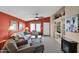 Living room featuring a neutral color scheme, built-in shelving, and a fireplace at 8500 E Southern Ave # 368, Mesa, AZ 85209