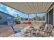 Covered patio with seating and colorful rug at 8500 E Southern Ave # 368, Mesa, AZ 85209