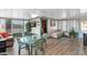 Sunroom features a dining area, seating, and a bed at 8500 E Southern Ave # 368, Mesa, AZ 85209