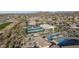 Aerial view featuring tennis courts, pools, and clubhouse at 8546 E Brittle Bush Rd, Gold Canyon, AZ 85118