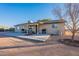 Covered patio, BBQ area, and spacious backyard at 8926 E Malorie Ln, Coolidge, AZ 85128