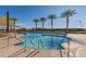 Relaxing freeform community pool with ample lounge chairs at 10320 E Tahoe Ave, Mesa, AZ 85212