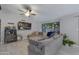 Modern living room with sectional sofa and large TV at 16637 N Landis Ln, Glendale, AZ 85306