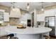 Large kitchen island with seating and quartz countertops at 1771 E Alegria Rd, San Tan Valley, AZ 85140