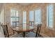 Breakfast nook with a round table and chairs, near window at 1828 N Sunview N --, Mesa, AZ 85205