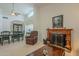 Dining area with a wooden table and chairs, near a fireplace at 1828 N Sunview N --, Mesa, AZ 85205