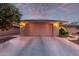 Two-car garage with solar panels on the roof at 19206 N Palo Verde Dr, Sun City, AZ 85373