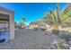 Backyard view of gravel and desert landscape at 20888 N Canyon Whisper Dr, Surprise, AZ 85387