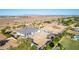 Aerial view of a house with spacious backyard, RV parking, and a basketball court at 21121 E Marsh Rd, Queen Creek, AZ 85142