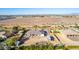 Aerial view of a single-story house with a large backyard and surrounding landscape at 21121 E Marsh Rd, Queen Creek, AZ 85142