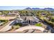 Aerial view of a beautiful home showcasing its unique architecture and landscaping at 21121 E Marsh Rd, Queen Creek, AZ 85142