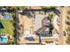 Aerial photo of a home with large backyard, RV parking and putting green at 21121 E Marsh Rd, Queen Creek, AZ 85142