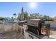 Built-in BBQ with smoker and stainless steel appliances at 21121 E Marsh Rd, Queen Creek, AZ 85142