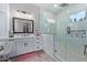 Spa-like bathroom with a walk-in shower, double vanity and modern design at 21121 E Marsh Rd, Queen Creek, AZ 85142