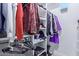 Large walk-in closet with ample shelving and hanging space at 21121 E Marsh Rd, Queen Creek, AZ 85142
