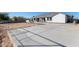 Large concrete slab in the backyard, ready for construction at 21121 E Marsh Rd, Queen Creek, AZ 85142