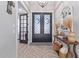 Bright and spacious entryway with herringbone floors at 21121 E Marsh Rd, Queen Creek, AZ 85142