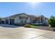 Home exterior with a large driveway and landscaping at 21121 E Marsh Rd, Queen Creek, AZ 85142