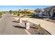 Modern house exterior with a landscaped yard and driveway at 21121 E Marsh Rd, Queen Creek, AZ 85142