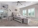 Spacious main bedroom with a plush bed and en-suite bathroom at 21121 E Marsh Rd, Queen Creek, AZ 85142
