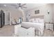 Bright main bedroom with a king-size bed and plenty of natural light at 21121 E Marsh Rd, Queen Creek, AZ 85142