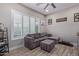 Cozy sitting area featuring a sectional sofa and large window at 21121 E Marsh Rd, Queen Creek, AZ 85142