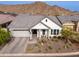 Charming single story home with mountain views and landscaped yard at 21354 W Minnezona Ave, Buckeye, AZ 85396