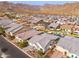 Aerial view of house and neighborhood, highlighting the property's proximity to amenities and other homes at 21354 W Minnezona Ave, Buckeye, AZ 85396
