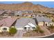 Aerial view of house and neighborhood, showcasing the property's location and surrounding community at 21354 W Minnezona Ave, Buckeye, AZ 85396