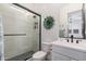 Clean bathroom with shower, toilet, and vanity at 21354 W Minnezona Ave, Buckeye, AZ 85396