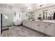 Modern bathroom with soaking tub, walk-in shower, and double vanity at 21354 W Minnezona Ave, Buckeye, AZ 85396