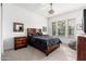 Guest bedroom with full-size bed and neutral decor at 21354 W Minnezona Ave, Buckeye, AZ 85396