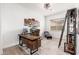 Functional home office with large desk and built-in shelving at 21354 W Minnezona Ave, Buckeye, AZ 85396