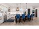 Modern kitchen with white cabinets, quartz countertops and island at 21354 W Minnezona Ave, Buckeye, AZ 85396