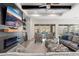 Living room with fireplace, built-ins, and access to the backyard at 21354 W Minnezona Ave, Buckeye, AZ 85396