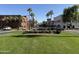 Verrado town square with lush landscaping and brick buildings at 21354 W Minnezona Ave, Buckeye, AZ 85396