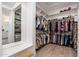 Large walk-in closet with ample shelving and hanging space at 21354 W Minnezona Ave, Buckeye, AZ 85396