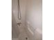Clean bathroom with shower/tub combo and tiled walls at 215 N Power Rd # 404, Mesa, AZ 85205
