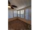 Sunroom with tiled floor and multiple windows with blinds at 215 N Power Rd # 404, Mesa, AZ 85205