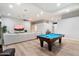 Relaxing game room with pool table and comfortable seating area at 22426 N 54Th Pl, Phoenix, AZ 85054