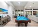 Game room boasts a pool table and ample space for entertainment at 22426 N 54Th Pl, Phoenix, AZ 85054