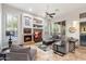 Bright living room with a comfortable sectional sofa and a fireplace at 22426 N 54Th Pl, Phoenix, AZ 85054