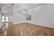 Bright dining room with hardwood floors and a chandelier at 3222 E Wickieup Ln, Phoenix, AZ 85050