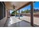 Covered patio overlooking a refreshing pool and spacious backyard at 3222 E Wickieup Ln, Phoenix, AZ 85050