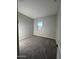 Spacious bedroom with carpet and large window at 3290 W San Cristobal Rd, San Tan Valley, AZ 85144