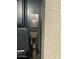 Modern front door with keyless entry and bronze handle at 3290 W San Cristobal Rd, San Tan Valley, AZ 85144