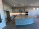 Spacious kitchen with large island, granite countertops, and light gray cabinets at 3290 W San Cristobal Rd, San Tan Valley, AZ 85144