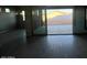 Open living area with sliding glass doors and tile floors at 3290 W San Cristobal Rd, San Tan Valley, AZ 85144