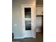 Walk-in pantry with glass-paned door and shelving at 3290 W San Cristobal Rd, San Tan Valley, AZ 85144