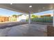 Backyard with covered patio, storage shed and gravel landscaping at 3350 W Wethersfield Rd, Phoenix, AZ 85029